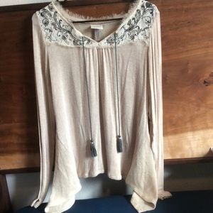 Lightweight, long sleeve, embroidered shirt.